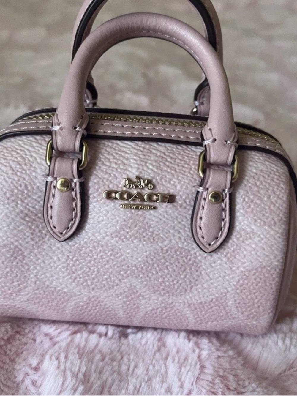 coach powder pink mini rowan bag charm